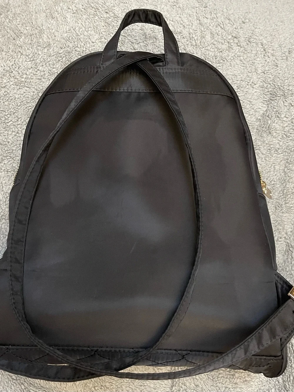 Doterra Black Quilted-Bottom Backpack with Gold Accents
